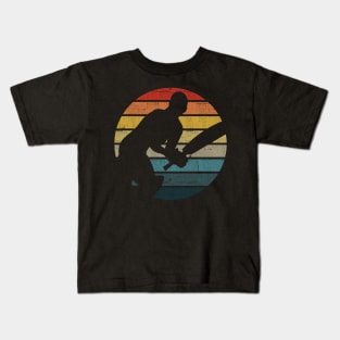 Cricket Player Silhouette On A Distressed Retro Sunset design Kids T-Shirt